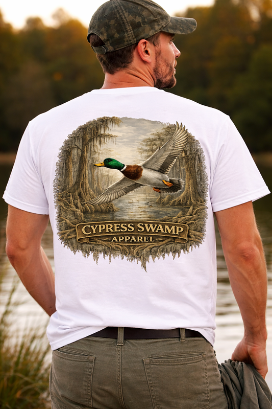 New Design Mallard in flight over the swamp